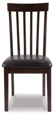 Ashley Furniture Hammis dining chair with dark wooden legs and upholstered beige seat and back, viewed head-on.