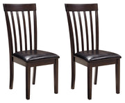 Ashley Furniture Hammis dining chair set featuring four upholstered chairs with wooden legs and a contemporary design.