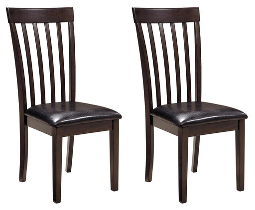 Ashley Furniture Hammis dining chair set featuring four upholstered chairs with wooden legs and a contemporary design.