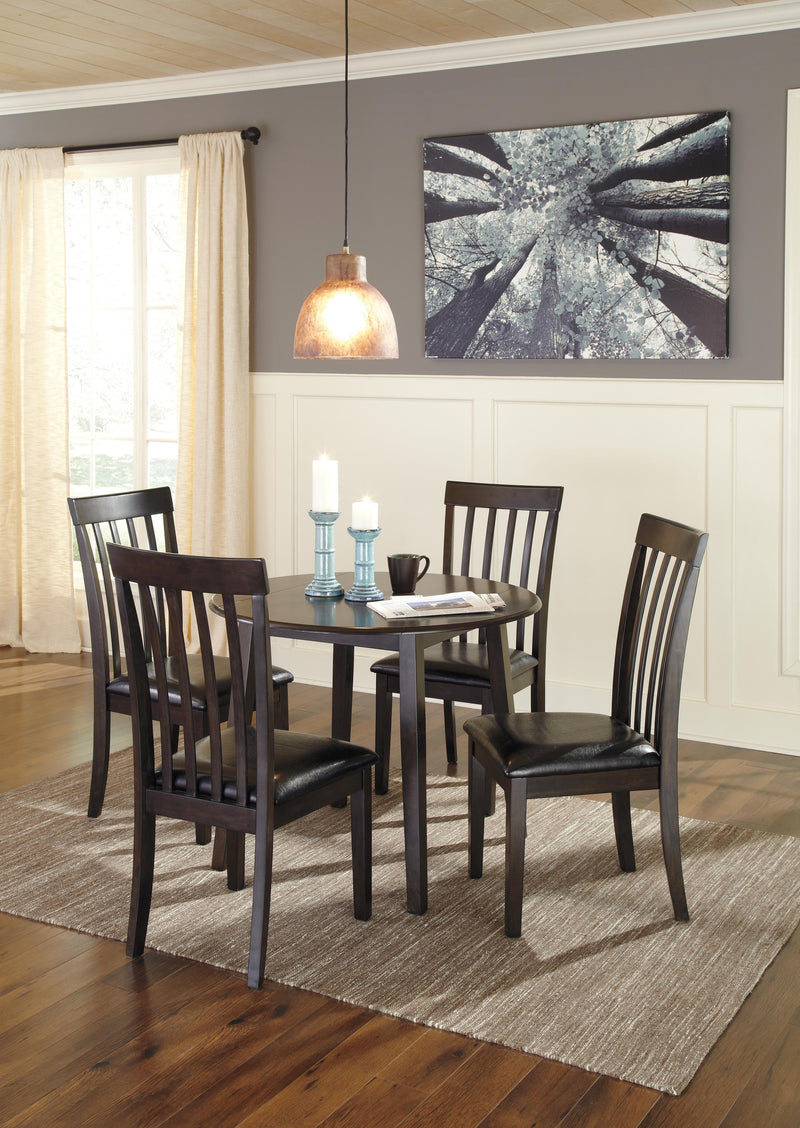Ashley Furniture Hammis dining set with a wooden table and six matching chairs in a modern dining room setting