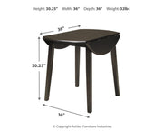 Ashley Furniture Hammis dining set with a wooden table and matching chairs in a modern dining room setting.