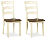 Ashley Furniture Woodanville dining chair set with four wooden chairs featuring upholstered seats, dark finish, and classic design.