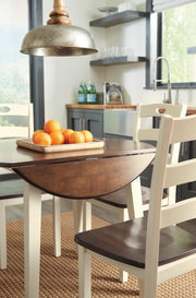 Ashley Furniture Woodanville dining room set with a wooden table and matching chairs, ideal for a stylish dining space.