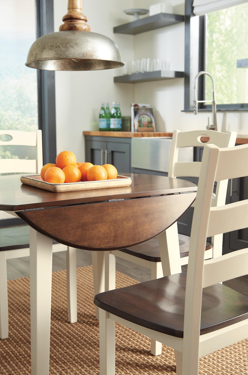 Ashley Furniture Woodanville dining room set with a wooden table and matching chairs, ideal for a stylish dining space.