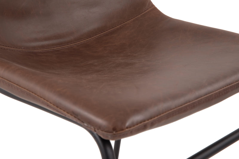 Ashley Furniture Centiar dining chair with wooden legs and upholstered seat, shown from a detailed side angle.