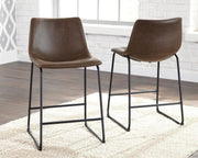 Ashley Furniture Centiar counter height bar stool with wooden legs and padded seat, shown from a front view.