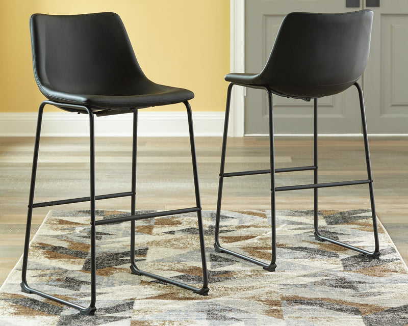 Ashley Furniture Centiar pub height bar stool with wooden legs and upholstered seat, shown in a close-up view.