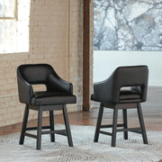 Ashley Furniture Tallenger Bar Stool Set with four modern wooden stools featuring upholstered seats and metal footrests.