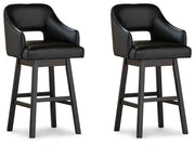 Set of Ashley Furniture Tallenger Barstools with wooden legs and upholstered seats, ideal for kitchen or bar area.