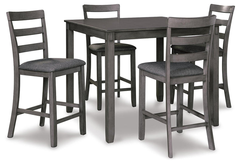 Ashley Furniture Bridson counter height dining table with four matching bar stools, shown from an angled side view.