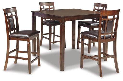 Ashley Furniture Bennox counter height dining table with four matching bar stools, showcasing a modern wood finish and sturdy design.