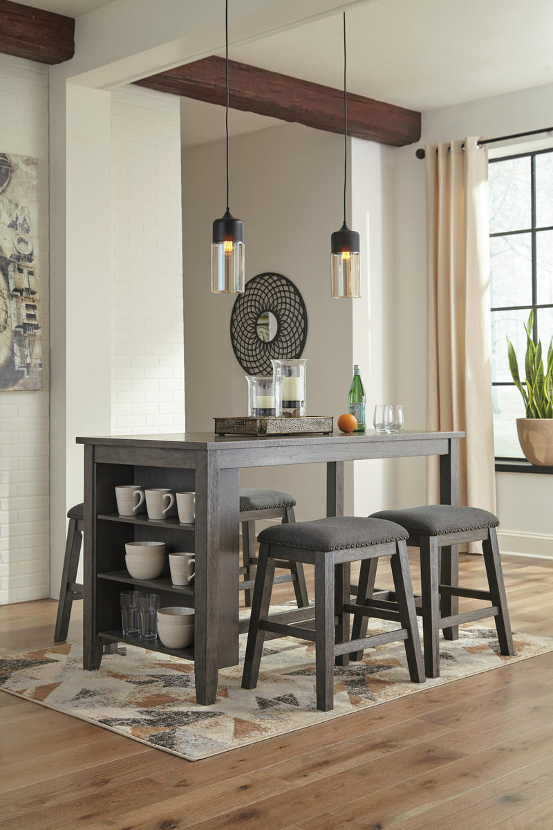 Set of Ashley Furniture Caitbrook counter height dining barstools with wooden seats and black metal frames, ideal for kitchen or bar area.