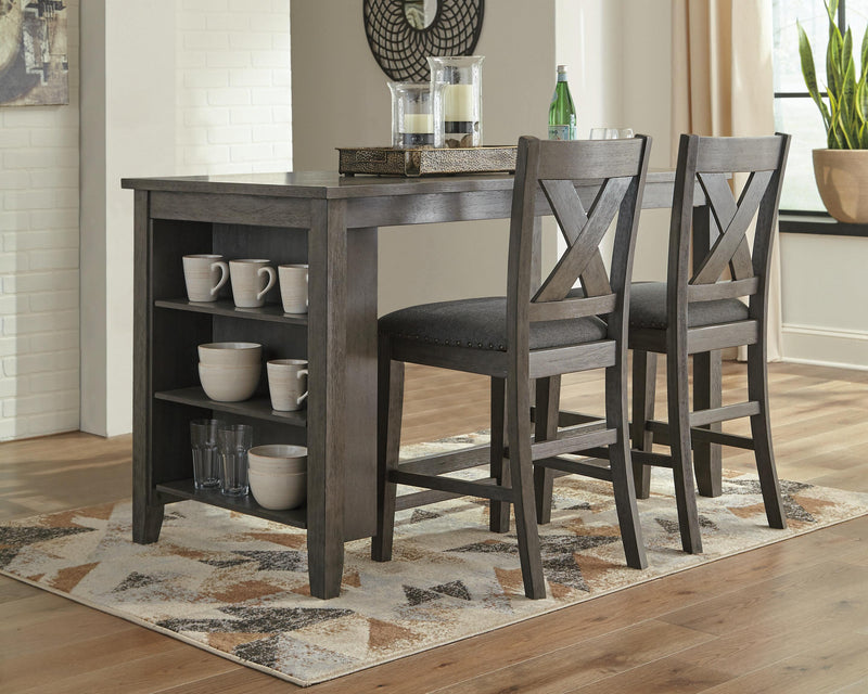 Set of Ashley Furniture Caitbrook counter height barstools with wooden legs and upholstered seats, ideal for dining areas.