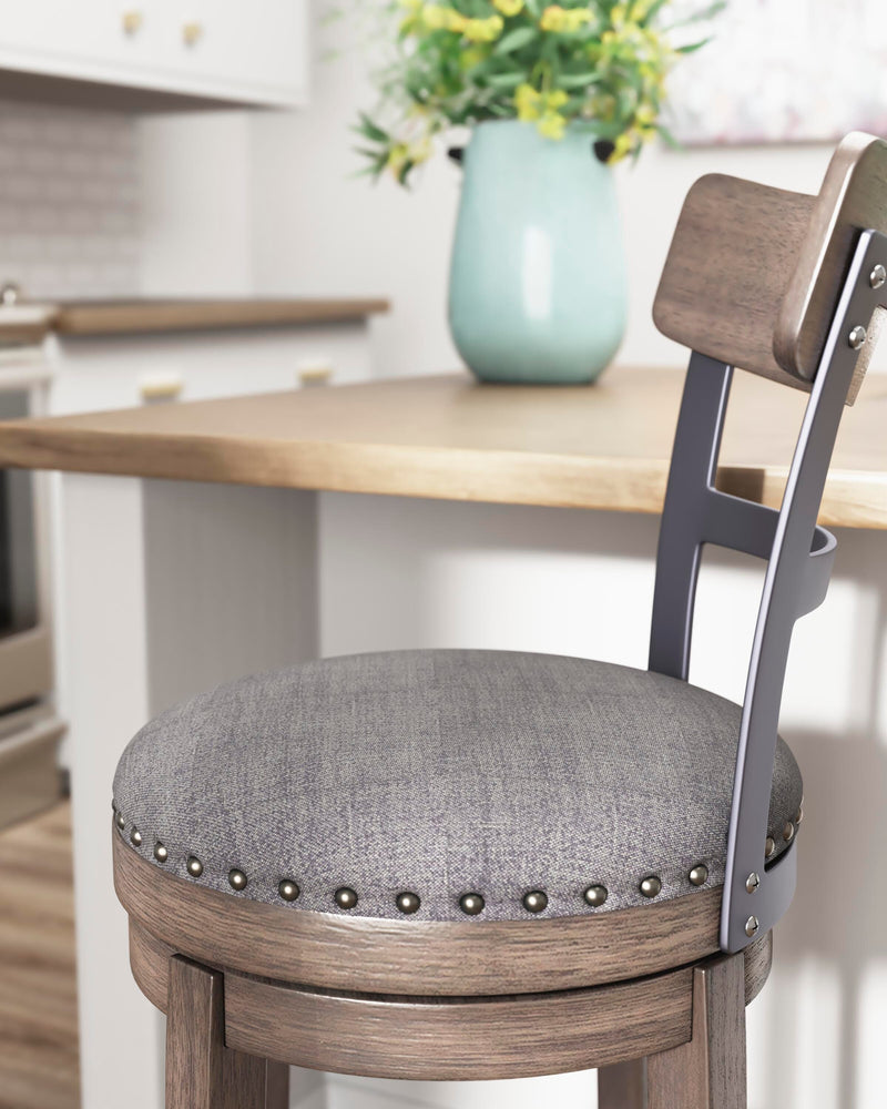 Ashley Furniture Caitbrook bar height bar stool with wooden legs and upholstered seat, detailed close-up image.