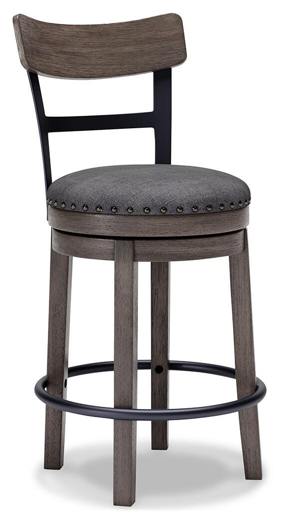 Ashley Furniture Caitbrook counter height bar stool with wooden legs and a cushioned seat, shown from an angled side view.