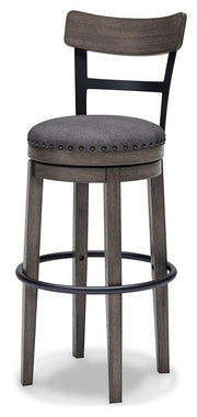 Ashley Furniture Caitbrook bar height barstool with wooden legs and upholstered seat, angled view showcasing stylish design.