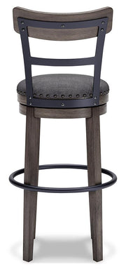 Ashley Furniture Caitbrook bar height barstool with wooden legs and backrest, showing a sleek, modern design from the rear view.