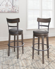 Ashley Furniture Caitbrook bar height bar stool with a wooden seat and metal frame, showing a modern design for home bar seating.