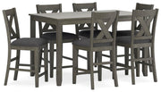Ashley Furniture Caitbrook counter height dining table with six matching bar stools, shown from an angled side view.