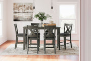 Ashley Furniture Caitbrook counter height dining table with six matching bar stools, featuring a modern wood finish and sturdy construction.