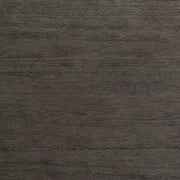 Ashley Furniture Caitbrook counter height dining table with a dark finish, showcasing a sturdy wooden surface and modern design.