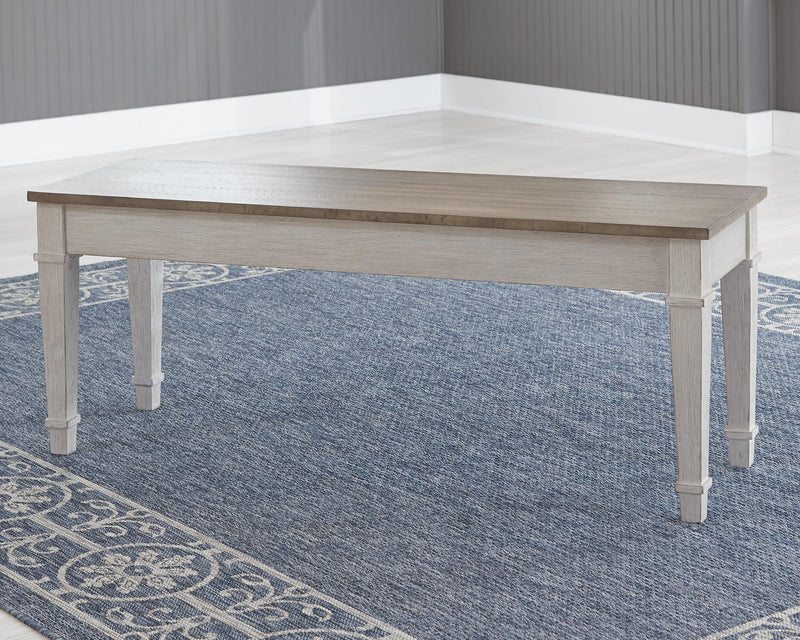 Ashley Furniture Skempton dining room set with a wooden table and matching chairs, featuring a classic design with a warm finish.