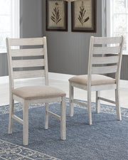 Ashley Furniture Skempton dining room set with a rectangular table and six upholstered chairs in a modern design.