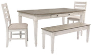 Ashley Furniture Skempton dining room set with a rectangular table and six upholstered chairs, featuring a warm wood finish.
