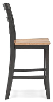 Side view of Ashley Furniture Gesthaven counter height barstool with wooden legs and upholstered seat, ideal for kitchen or bar area.