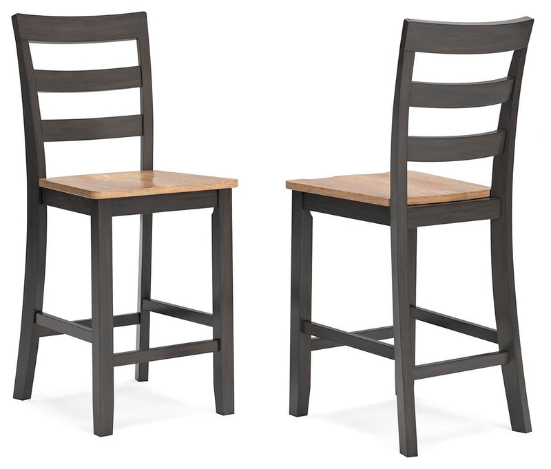 Ashley Furniture Gesthaven counter height barstool with wooden legs and upholstered seat, shown from an angled side view.