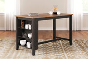 Ashley Furniture Gesthaven counter height dining table with wood finish and sturdy legs, ideal for casual dining spaces.