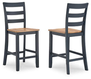 Ashley Furniture Gesthaven counter height barstool with a wooden seat and metal frame, shown from an angled side view.