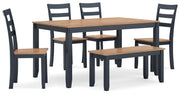 Ashley Furniture Gesthaven dining table with four chairs and a bench, showcasing a stylish wood finish and modern design.