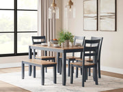 Ashley Furniture Gesthaven dining table with four chairs and a bench, showcasing a stylish wood finish and modern design.