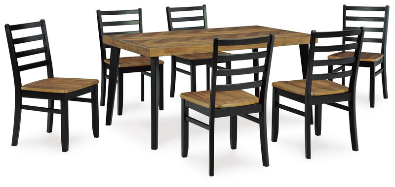 Ashley Furniture Blondon dining table with six matching chairs, modern wooden dining set shown from an angled view.