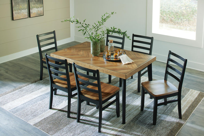 Ashley Furniture Blondon dining table with six matching chairs, showcasing a modern wooden design for elegant dining spaces.