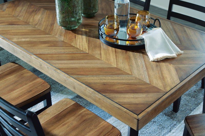 Ashley Furniture Blondon dining table with six matching chairs, featuring a sleek wood finish and elegant design.
