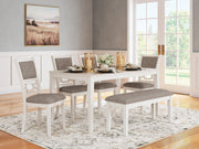 Ashley Furniture Erinberg dining table with four chairs and a matching bench, ideal for family dining spaces.