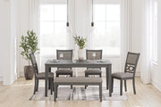 Ashley Furniture dining room set with Wrenning table, 4 chairs, and a bench, featuring a modern wood finish.