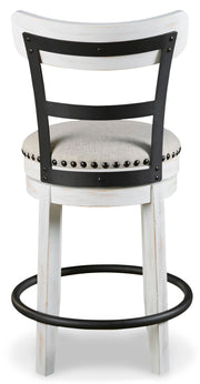 Ashley Furniture Valebeck counter height bar stool with dark wood finish and cushioned seat, shown from the back.