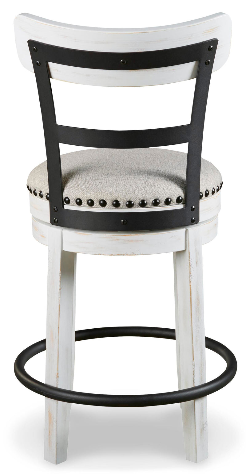 Ashley Furniture Valebeck counter height bar stool with dark wood finish and cushioned seat, shown from the back.