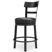 Ashley Furniture Valebeck counter height bar stool with wooden legs and upholstered seat, shown from an angled side view.