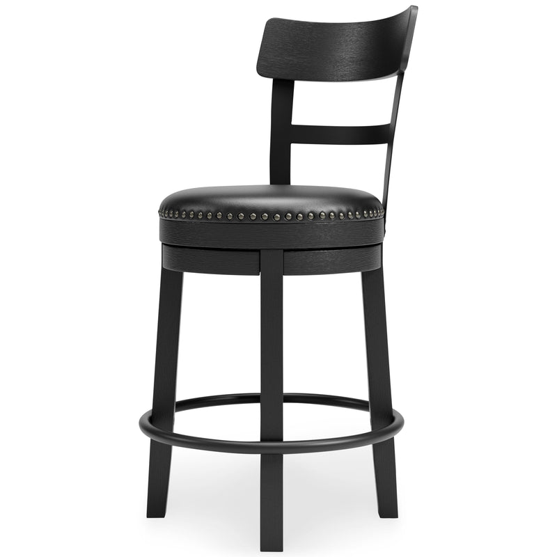 Ashley Furniture Valebeck counter height bar stool with wooden legs and upholstered seat, shown from an angled side view.
