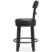 Ashley Furniture Valebeck counter height bar stool with wooden legs and cushioned seat, shown from a side angle.