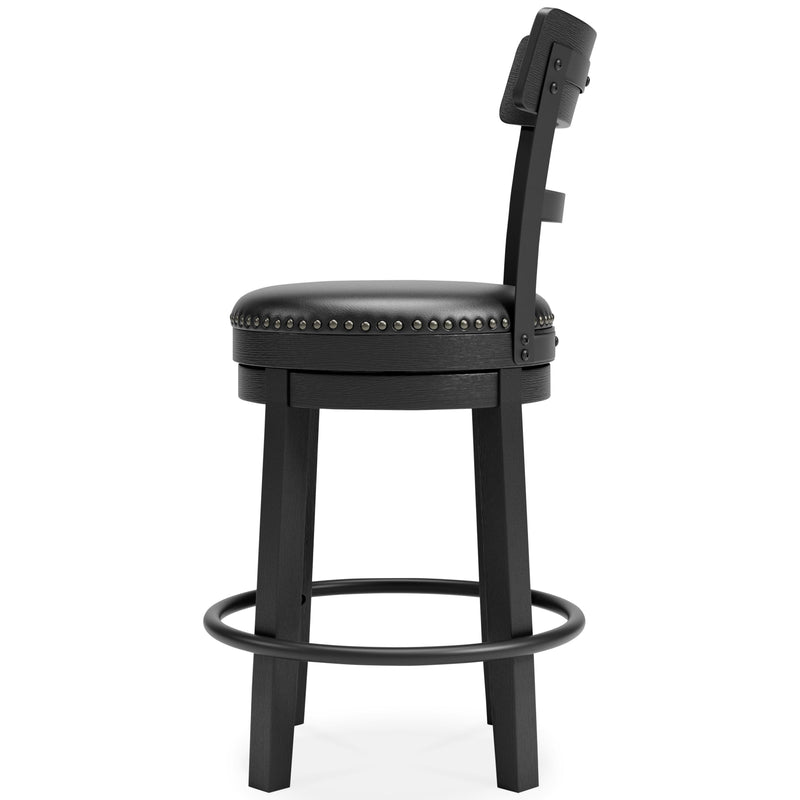 Ashley Furniture Valebeck counter height bar stool with wooden legs and cushioned seat, shown from a side angle.