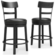 Ashley Furniture Valebeck counter height bar stool with wooden legs and cushioned seat, shown from side angle.