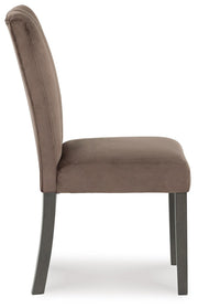 Ashley Jeshina Dining Chair with wooden legs and upholstered seat, shown from the side view.