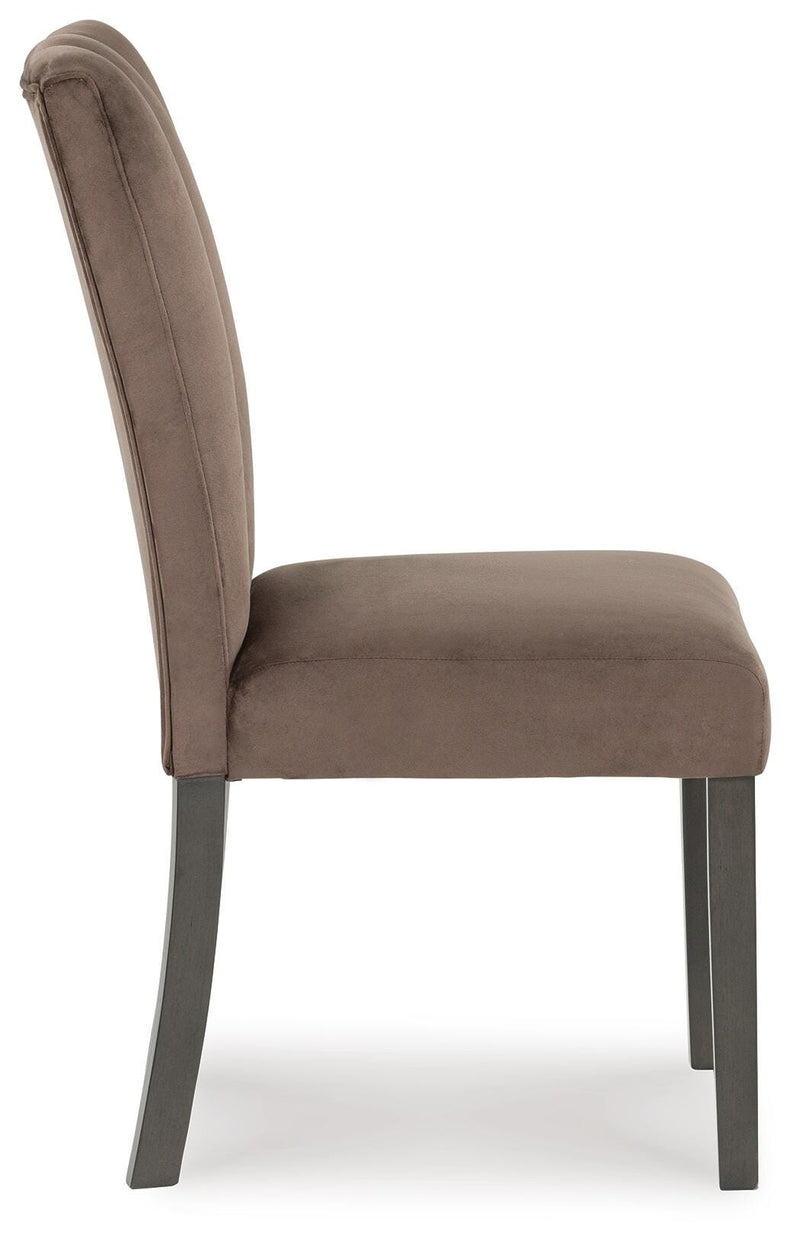 Ashley Jeshina Dining Chair with wooden legs and upholstered seat, shown from the side view.