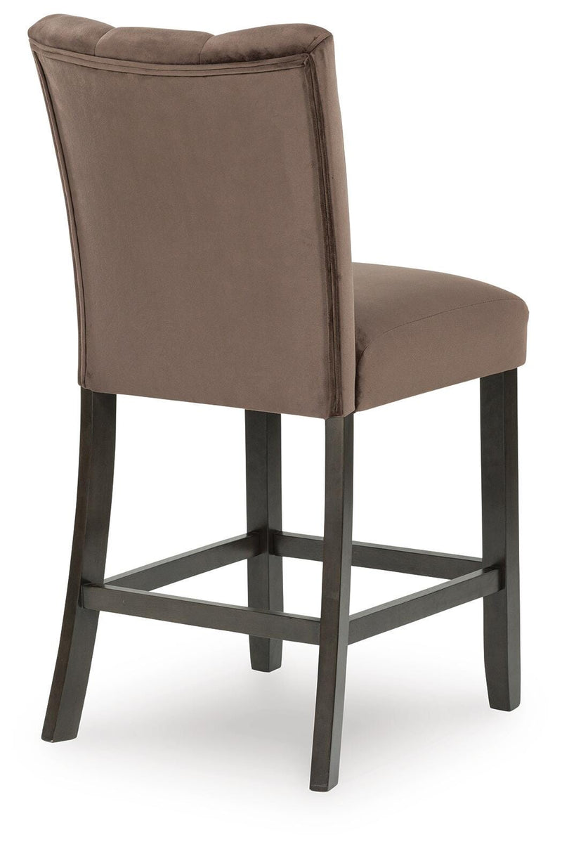 Ashley Furniture Jeshina counter height barstool with padded seat and backrest, featuring a sleek wooden frame and modern design.