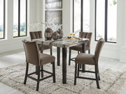 Ashley Furniture Jeshina dining room set with a wooden table and matching chairs in a modern dining space.